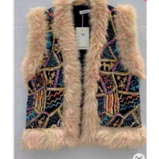 Gilet sans manche et fausse fourrure