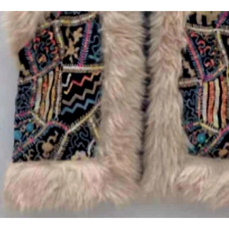 Gilet sans manche et fausse fourrure